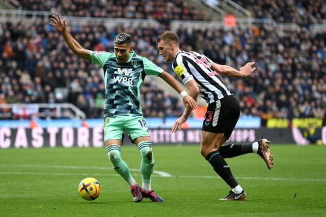 Dermot Gallagher believes the referee made the correct call by not awarding Fuham a penalty following a tug on Andreas Pereira by Dan Burn (Photo by Michael Regan/Getty Images)