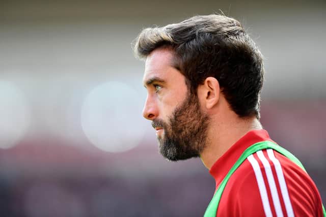 Sunderland striker Will Grigg has been urged to move to the North East by manager Phil Parkinson