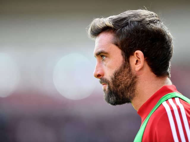Sunderland striker Will Grigg has been urged to move to the North East by manager Phil Parkinson