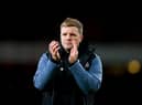 Newcastle United head coach Eddie Howe applauds the fans after the game.