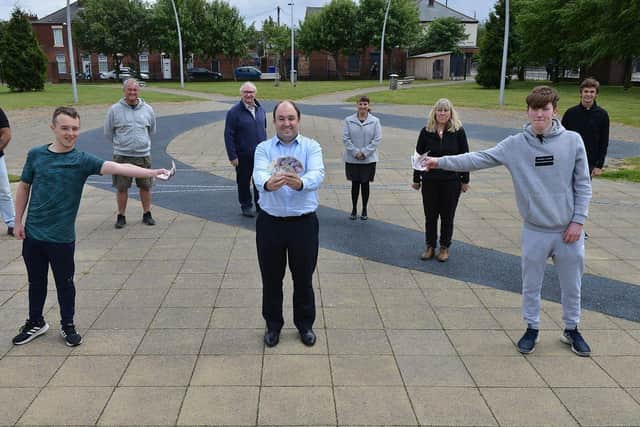 Ian Crawley (centre) of South Tyneside and Sunderland NHS Foundation Trust with Hebburn Army Cadets Aaron Robertson-McDowell (left) and Peter Hamilton as family, friends and supporters look on.