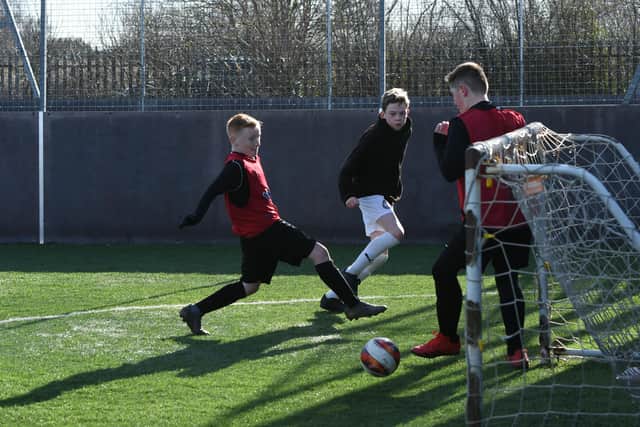 Action from a charity marathon five-a-side football match at Harton & Westoe Miners Welfare, on Friday.