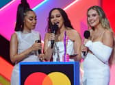 Little Mix members Leigh-Anne Pinnock (left), Jade Thirlwall (middle) and Perrie Edwards (right) at the Brit Awards. Photo: PA.