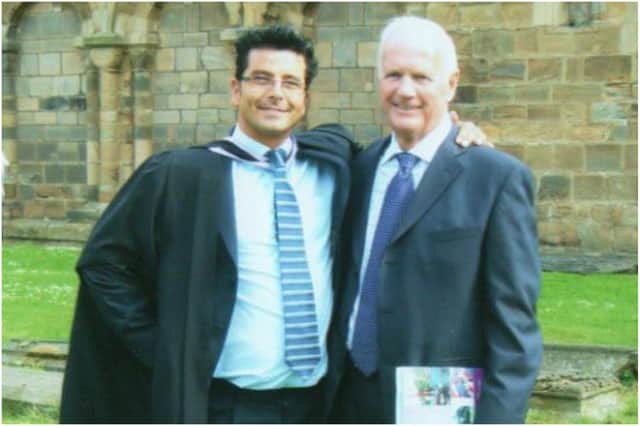 George Charlton at his university graduation with this father.