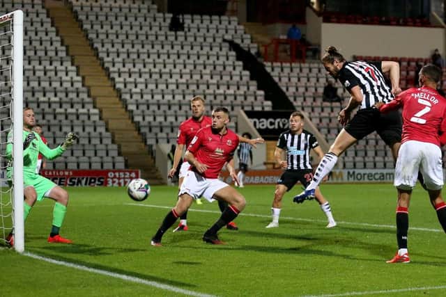 MORECAMBE, ENGLAND - SEPTEMBER 23: Andy Carroll of Newcastle United heads wide during the Carabao Cup third round match between Morecambe and Newcastle United at Globe Arena on September 23, 2020 in Morecambe, England.