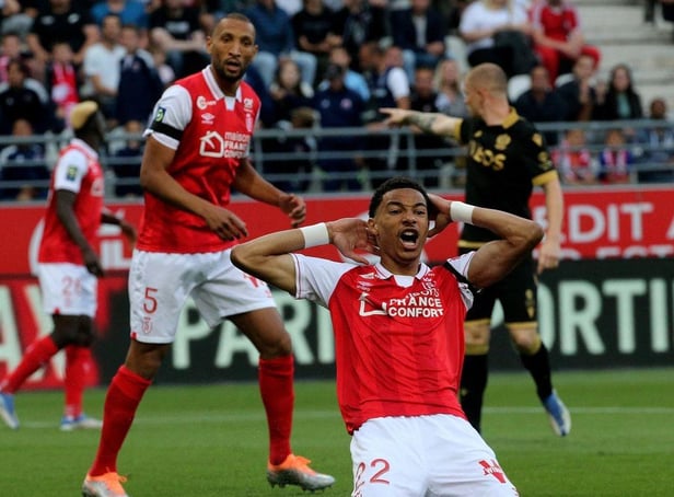 Reims' forward Hugo Ekitike celebrates after scoring a goal during the French L1 football match between Stade de Reims and OGC Nice at Stade Auguste-Delaune in Reims, northern France on May 21, 2022. (Photo by FRANCOIS NASCIMBENI/AFP via Getty Images)