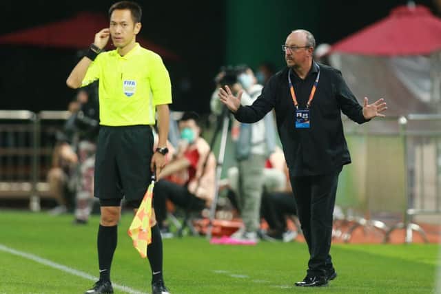 This photo taken on August 20, 2020 shows Dalian Pro coach Rafael Benitez (R) reacting during their Chinese Super League football match against Shenzhen FC in Dalian, in China's northeast Liaoning province. - Former Real Madrid and Liverpool boss Rafael Benitez vowed improvements at Dalian Pro after their latest defeat left them rooted to the bottom of their group in the Chinese Super League. (Photo by STR / AFP) / China OUT (Photo by STR/AFP via Getty Images)