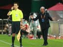 This photo taken on August 20, 2020 shows Dalian Pro coach Rafael Benitez (R) reacting during their Chinese Super League football match against Shenzhen FC in Dalian, in China's northeast Liaoning province. - Former Real Madrid and Liverpool boss Rafael Benitez vowed improvements at Dalian Pro after their latest defeat left them rooted to the bottom of their group in the Chinese Super League. (Photo by STR / AFP) / China OUT (Photo by STR/AFP via Getty Images)