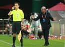 This photo taken on August 20, 2020 shows Dalian Pro coach Rafael Benitez (R) reacting during their Chinese Super League football match against Shenzhen FC in Dalian, in China's northeast Liaoning province. - Former Real Madrid and Liverpool boss Rafael Benitez vowed improvements at Dalian Pro after their latest defeat left them rooted to the bottom of their group in the Chinese Super League. (Photo by STR / AFP) / China OUT (Photo by STR/AFP via Getty Images)