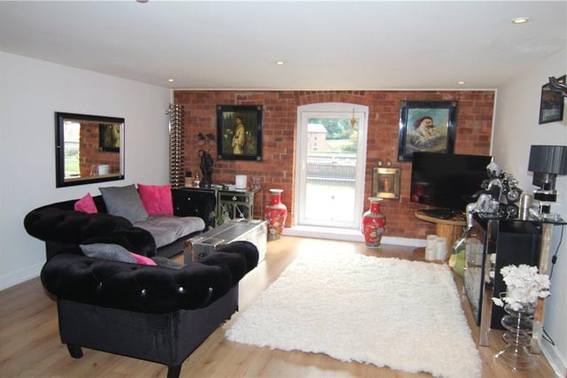 The double glazed door in the living room leads to a Juliette balcony with beautiful views of the river bank. 

Photo: Rightmove