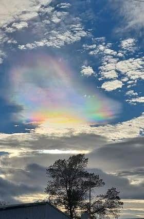 A 'rainbow cloud', thought to be cloud iridescence, captured on camera by John Rumney.