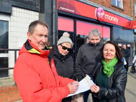 Colin Campbell (L) has launched a petition campaign to help save the closure of Virgin Money Bank at the Nook, with supporters Stella Campbell, Lol Campbell and Doris Osmane (R)