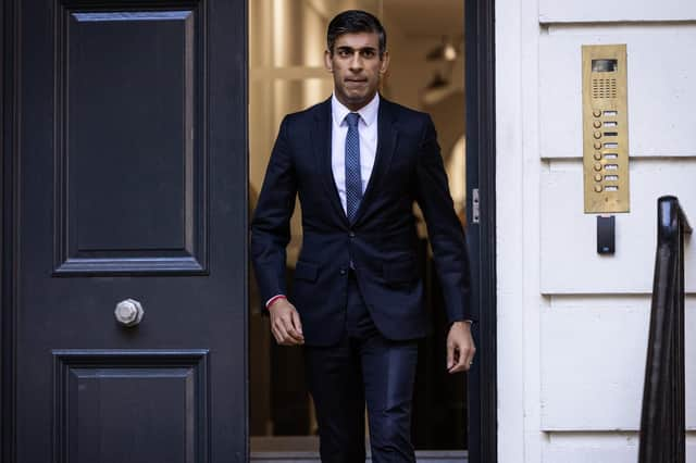 LONDON, ENGLAND - OCTOBER 24: New Conservative Party leader and incoming prime minister Rishi Sunak leaves the Conservative Party Headquarters after having been announced as the winner of the Conservative Party leadership contest on October 24, 2022 in London, England. Rishi Sunak was appointed as Conservative leader and the UK's next Prime Minister after he was the only candidate to garner 100-plus votes from Conservative MPs in the contest for the top job. (Photo by Dan Kitwood/Getty Images)