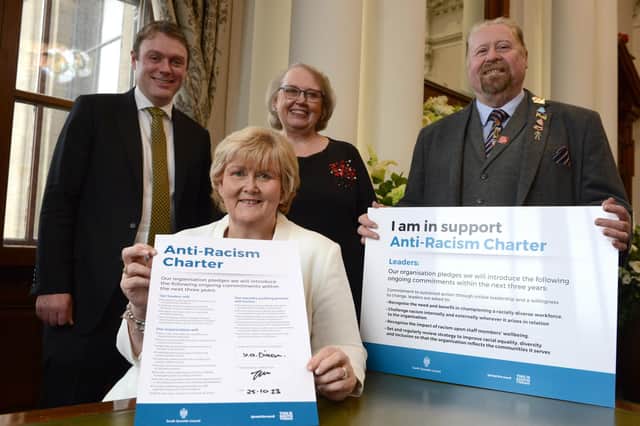 South Tyneside Council Leader Cllr Tracey Dixon, chief executive Jonathan Tew, Cllr Joanne Bell and Cllr Paul Dean signing the Anti-Racism Charter.
