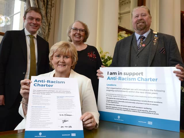 South Tyneside Council Leader Cllr Tracey Dixon, chief executive Jonathan Tew, Cllr Joanne Bell and Cllr Paul Dean signing the Anti-Racism Charter.
