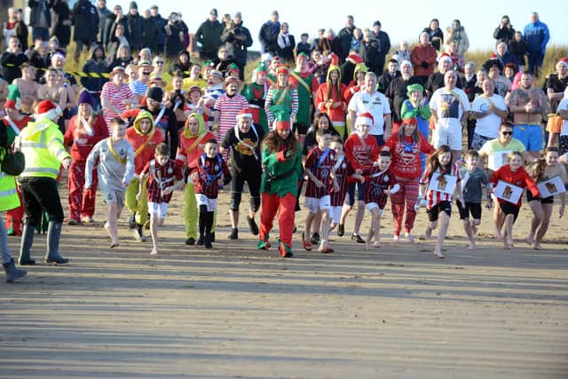 Annual Cancer Connections Boxing Day dip at Littlehaven Beach.