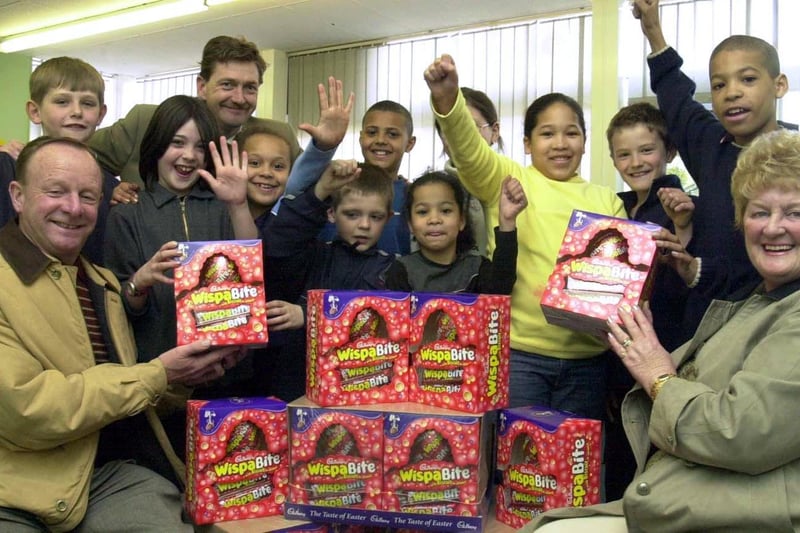 Ever-generous lottery winners Raymond and Barbara Wragg pictured handing over 180 Easter eggs to the school council on behalf of the students of the school - unfortunately the school wasn't named in this caption! It may be Park Hill School, which they supported