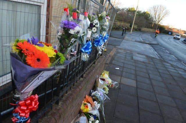 Floral tributes at the crash scene