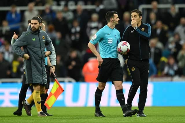 Julen Lopetegui, Manager of Wolverhampton Wanderers, talks to match referee Andy Madley following the Premier League match between Newcastle United and Wolverhampton Wanderers at St. James Park on March 12, 2023 in Newcastle upon Tyne, England. (Photo by Michael Regan/Getty Images)