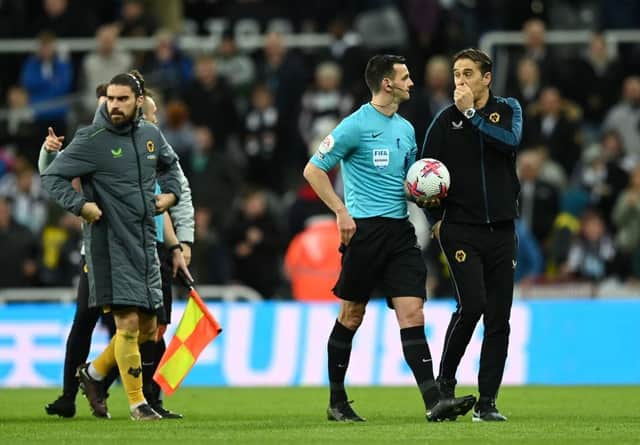 Julen Lopetegui, Manager of Wolverhampton Wanderers, talks to match referee Andy Madley following the Premier League match between Newcastle United and Wolverhampton Wanderers at St. James Park on March 12, 2023 in Newcastle upon Tyne, England. (Photo by Michael Regan/Getty Images)