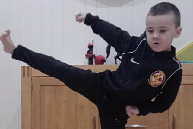 Joshua practising his karate moves