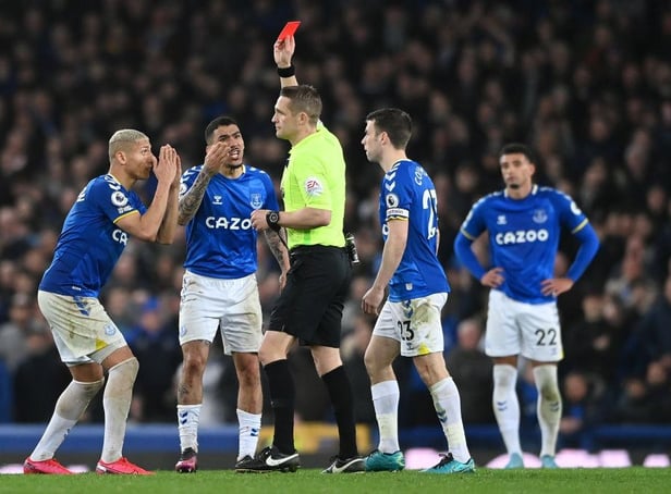Richarlison of Everton reacts as Allan of Everton is shown a red card from referee Craig Pawson during the Premier League match between Everton and Newcastle United at Goodison Park on March 17, 2022 in Liverpool, England. (Photo by Stu Forster/Getty Images)