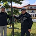 Tom Fennelly (right) and Wolfgang Mohrhenn (left) pictured on the last visit in 2019 at the Green Route Oak Tree of Friendship planted outside the Littlehaven Hotel in 1999 to mark the start/finish of the Green Route between the twin towns.
