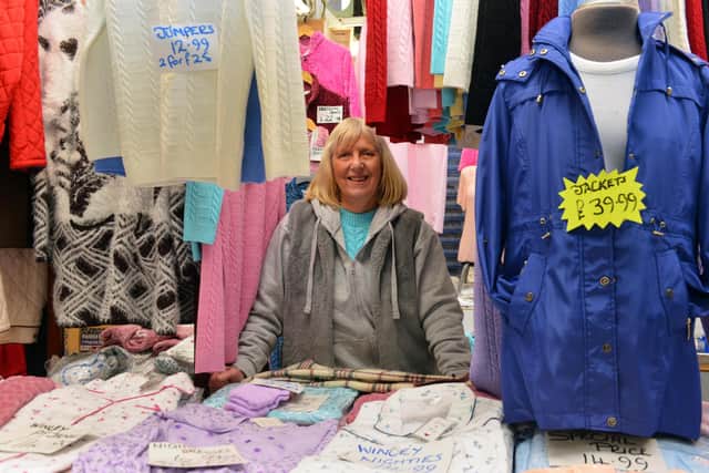 LG Fashions charity champ Lilian Griffiths at her Jackie White's Market clothing stall.