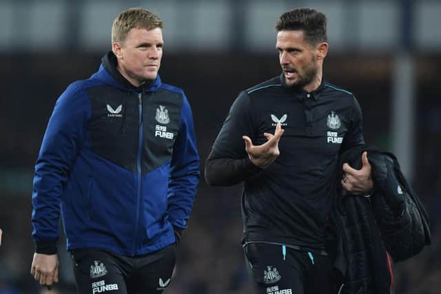 Newcastle United's English head coach Eddie Howe (L) and Newcastle United's assistant coach Jason Tindall (R) chat as the leave at half-time in the English Premier League football match between Everton and Newcastle United at Goodison Park in Liverpool, north west England on March 17, 2022. (Photo by ANTHONY DEVLIN/AFP via Getty Images)