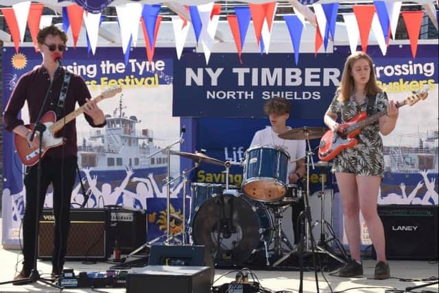The band Trinity with Luke (left) and Ryan on drums, has been performing together for two years.