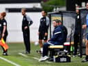 Sunderland boss Lee Johnson watches on at Harrogate