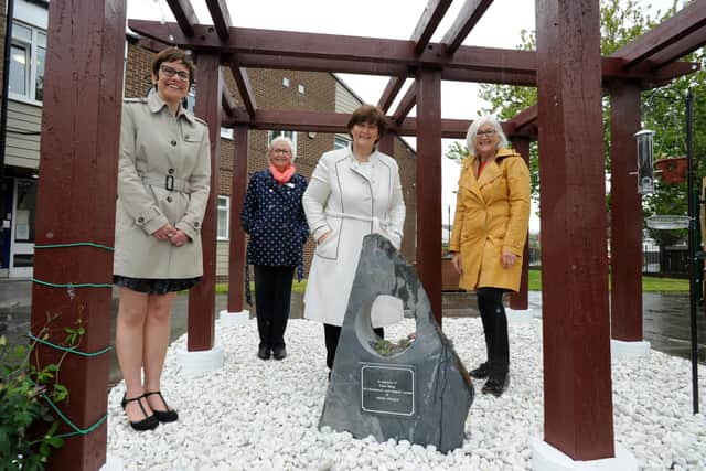 South Tyneside Council leader Cllr Tracey Dixon, deputy leader Cllr Joan Atkinson, Cllr Anne Hetherington, and Vicki Pattison, at Clare Blake's memorial garden, Clasper Court, South Shields.