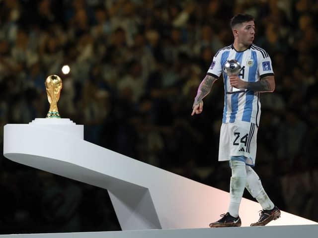 Enzo Fernandez of Argentina poses with the FIFA Young Player award trophy at the award ceremony following the FIFA World Cup Qatar 2022 Final match between Argentina and France at Lusail Stadium on December 18, 2022 in Lusail City, Qatar. (Photo by Lars Baron/Getty Images)