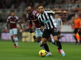 Callum Wilson of Newcastle United battles for possession with Angelo Ogbonna of West Ham United during the Premier League match between Newcastle United and West Ham United at St. James Park on February 04, 2023 in Newcastle upon Tyne, England. (Photo by Ian MacNicol/Getty Images)