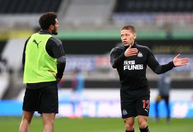 Dwight Gayle talks to Joelinton before the game.
