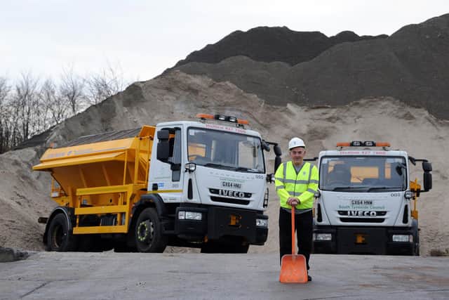 South Tyneside Cllr Ernest Gibson with the road salt stockpile at Middlefields Depot, South Shields.