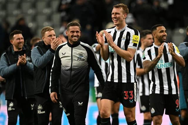 Newcastle United's Dan Burn applauds fans after the club's Carabao Cup win over Leicester City.