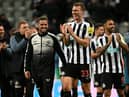 Newcastle United's Dan Burn applauds fans after the club's Carabao Cup win over Leicester City.