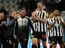 Newcastle United's Dan Burn applauds fans after the club's Carabao Cup win over Leicester City.