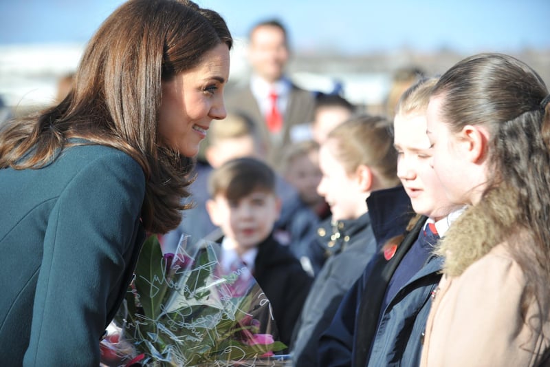 The Duchess of Cambridge gets to chat to local children. Does this bring back happy memories?