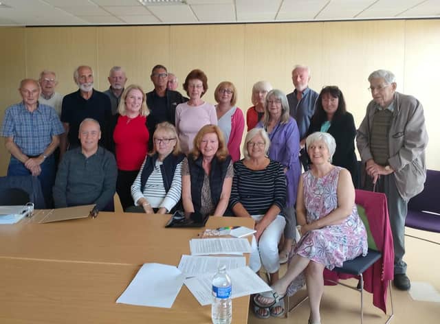 Emma Lewell-Buck MP (red top) met with protesters on August 5.