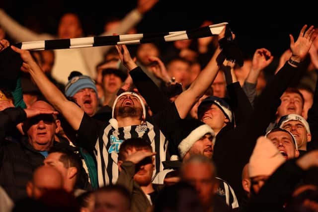 Newcastle United fans show their support at the King Power Stadium.