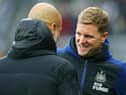 Newcastle United head coach Eddie Howe and Manchester City manager Pep Guardiola last season.