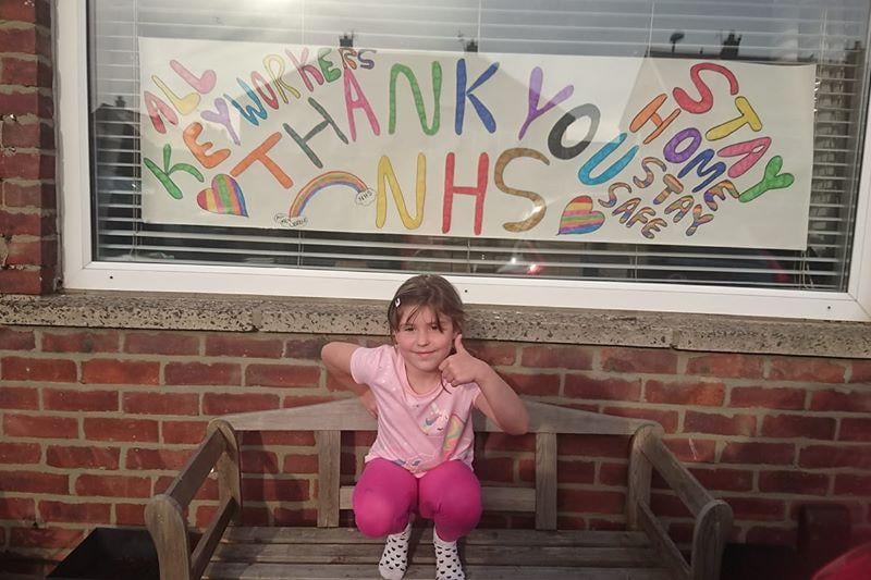 Here's Olivia-grace Houston, aged 6, showing support for all NHS staff and key workers.