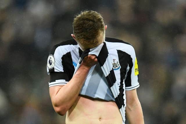Newcastle United midfielder Sean Longstaff reacts during the defeat to Liverpool.