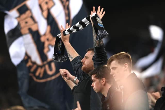Newcastle fans support their team during the Premier League match between Newcastle United and Arsenal at St. James Park on May 16, 2022 in Newcastle upon Tyne, England. (Photo by Stu Forster/Getty Images)