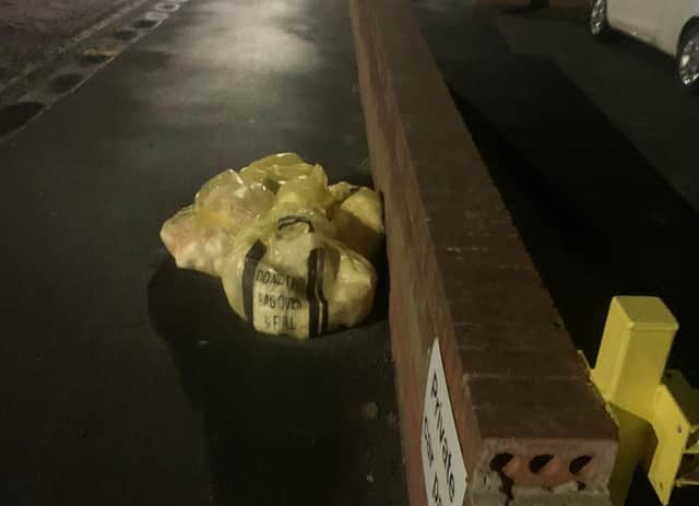Bags of nappies and PPE dumped outside the nursery's car park.