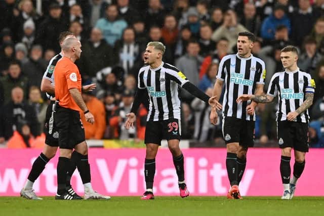 Newcastle United's Bruno Guimaraes reacts after being sent off.