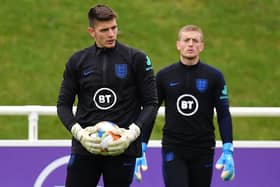 England's goalkeeper Nick Pope (L) and England's goalkeeper Jordan Pickford attend an England team training session at St George's Park in Burton-on-Trent  (Photo by PAUL ELLIS/AFP via Getty Images)