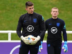 England's goalkeeper Nick Pope (L) and England's goalkeeper Jordan Pickford attend an England team training session at St George's Park in Burton-on-Trent  (Photo by PAUL ELLIS/AFP via Getty Images)